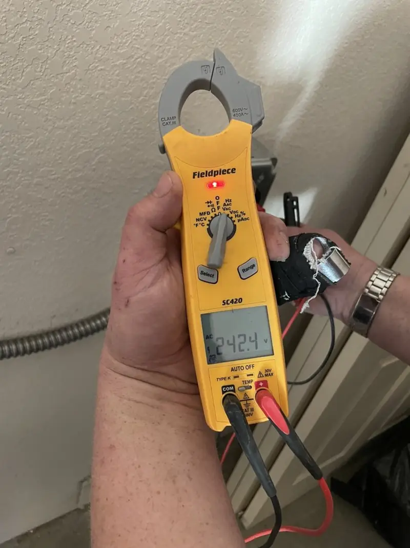 Voltage testing with clamp meter during Generator Installation in Abilene
